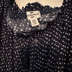 Long sleeve cropped blouse. Navy blue with white polkadots.